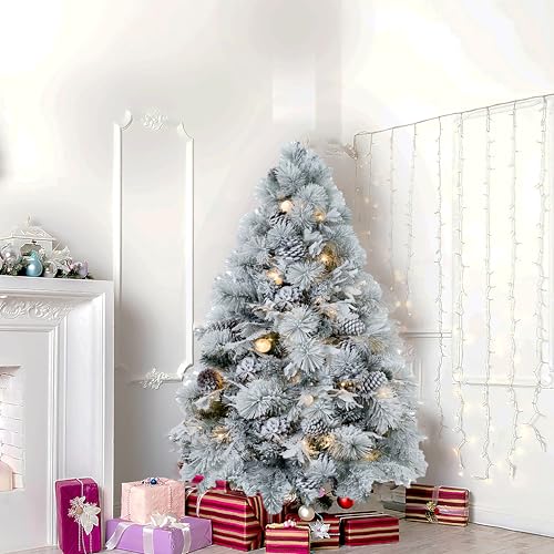 Darla 4.5ft Snow Flocked Rotating Christmas Tree with Star Projector