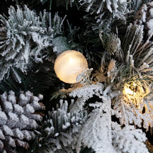 Darla 7.5ft Snow Flocked Rotating Christmas Tree with Star Projector