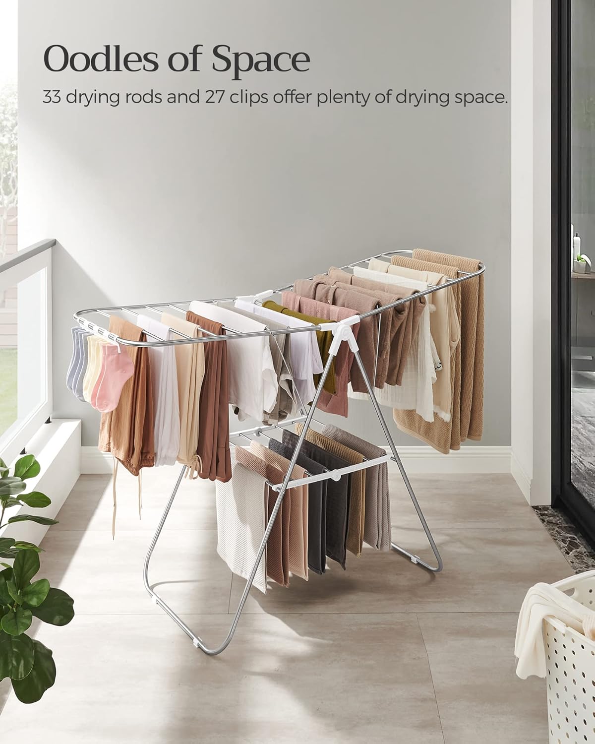 SONGMICS Clothes Drying Rack, with Sock Clips, Metal Laundry Rack, Foldable, Space-Saving, Free-Standing Airer, with 2 Height-Adjustable Gullwings, Indoor Outdoor Use, Silver and White ULLR052W01 - NestledHome