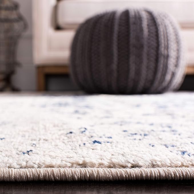 SAFAVIEH Madison Collection Area Rug - 8' Round, Cream & Navy, Snowflake Medallion Distressed Design, Non-Shedding & Easy Care, Ideal for High Traffic Areas in Living Room, Bedroom (MAD603D)