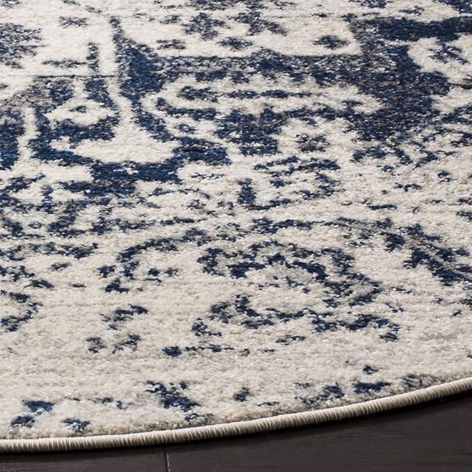 SAFAVIEH Madison Collection Area Rug - 8' Round, Cream & Navy, Snowflake Medallion Distressed Design, Non-Shedding & Easy Care, Ideal for High Traffic Areas in Living Room, Bedroom (MAD603D)